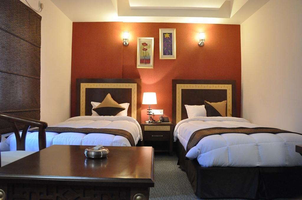 Silk Route Hotel Guwahati Quarto foto